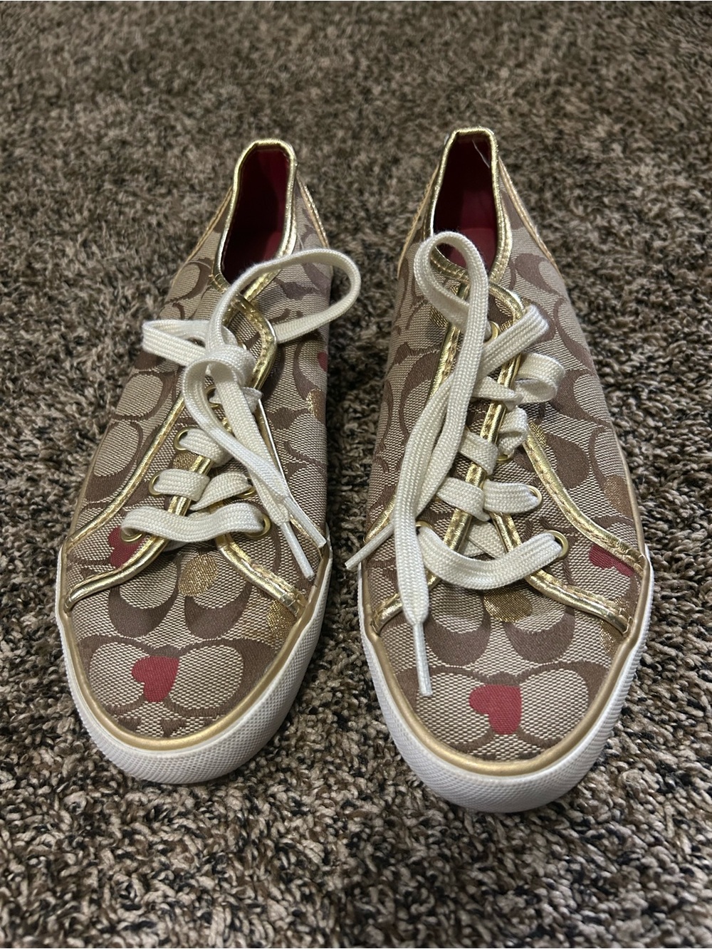 Coach Beige Signature Canvas Sneakers with Gold Trim and Red Accents
